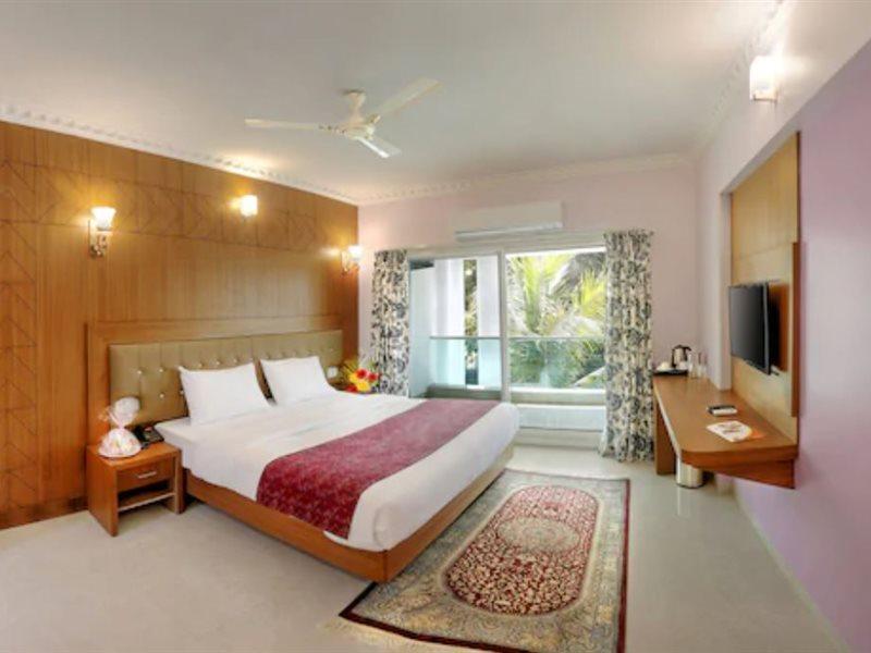 Jyothis Residency Hotel กอลลูร์ ภายนอก รูปภาพ